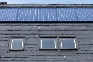 Exemple de toiture en ardoises naturelles grises d'une maison en Brabant wallon