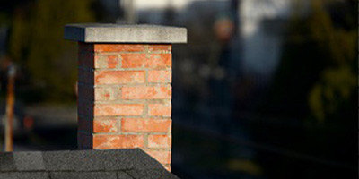 Contrôle et bardage de cheminée par un couvreur de Namur